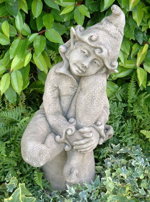 Jenny - a pixie statue with bells on her clothes
